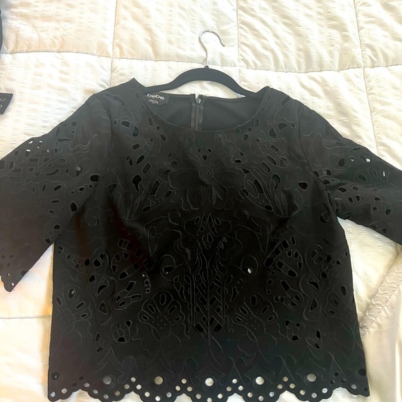 Bebe Laser Cut Floral Cropped Blouse with Scalloped Hem in Black medium top - Picture 2 of 4